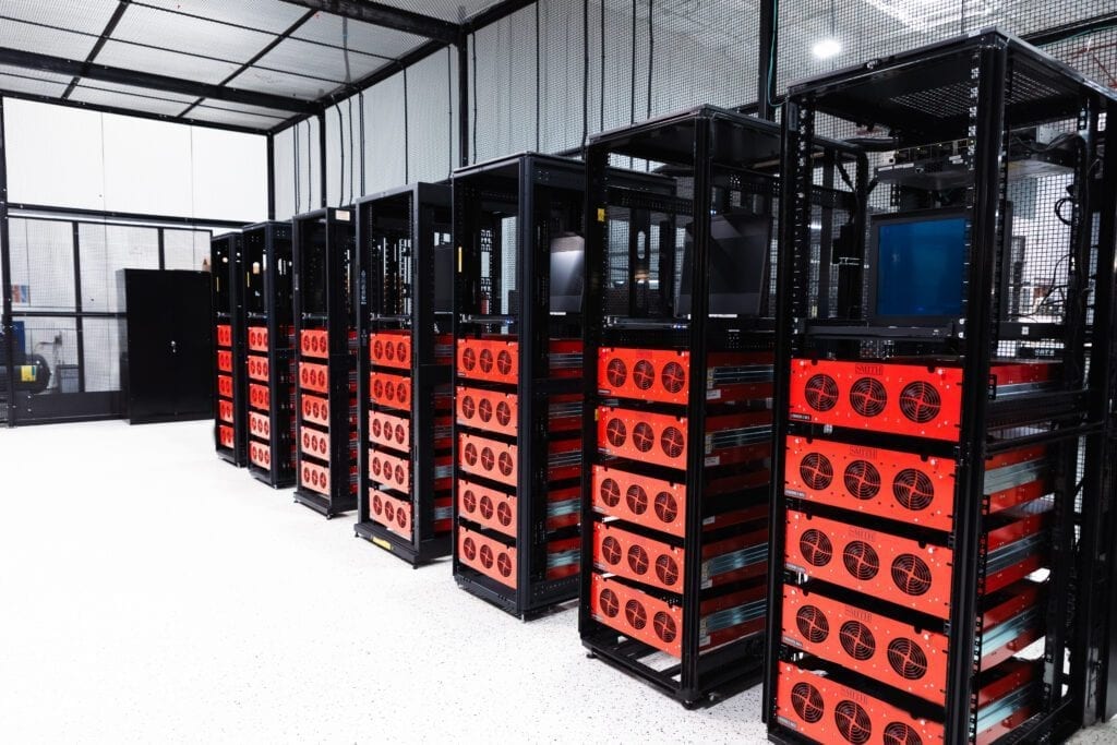 JXT data center operations team working with server hardware